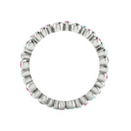 Through-finger view of the 18ct white gold eternity ring, showcasing the smooth, polished interior under-gallery and the clean, secure settings.