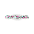 Top-down studio hero shot of the white gold alternative eternity ring, showcasing the unique linked bubble design precisely set with mixed precious gemstones.