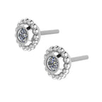 An angled perspective of the Silver Mini Alto earrings, highlighting the architectural silver mounting and the light-reflecting clarity of the white topaz stones.