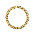 Through-finger view of the 18ct yellow gold eternity ring, showcasing the smooth, polished interior under-gallery and the clean, secure settings.
