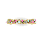 Top-down studio hero shot of the yellow gold alternative eternity ring, showcasing the unique linked bubble design set with mixed precious gemstones.